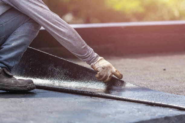 Professional Waterproofing technician working in Albany, IN